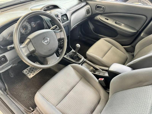 Nissan 1.6 MT FWD (107 л.с.) Авто Люкс KIA Севастополь